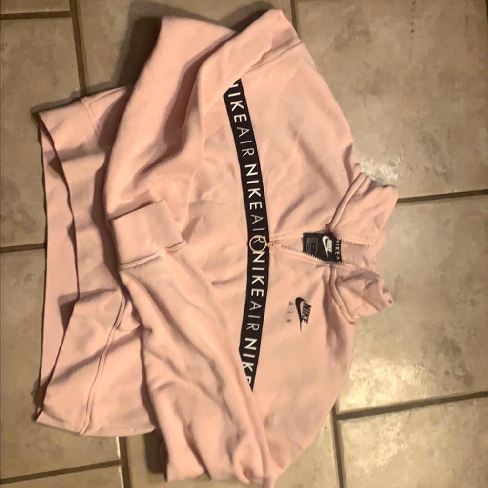 Nike Air Women’s 1/2- zip top in Echo Pink